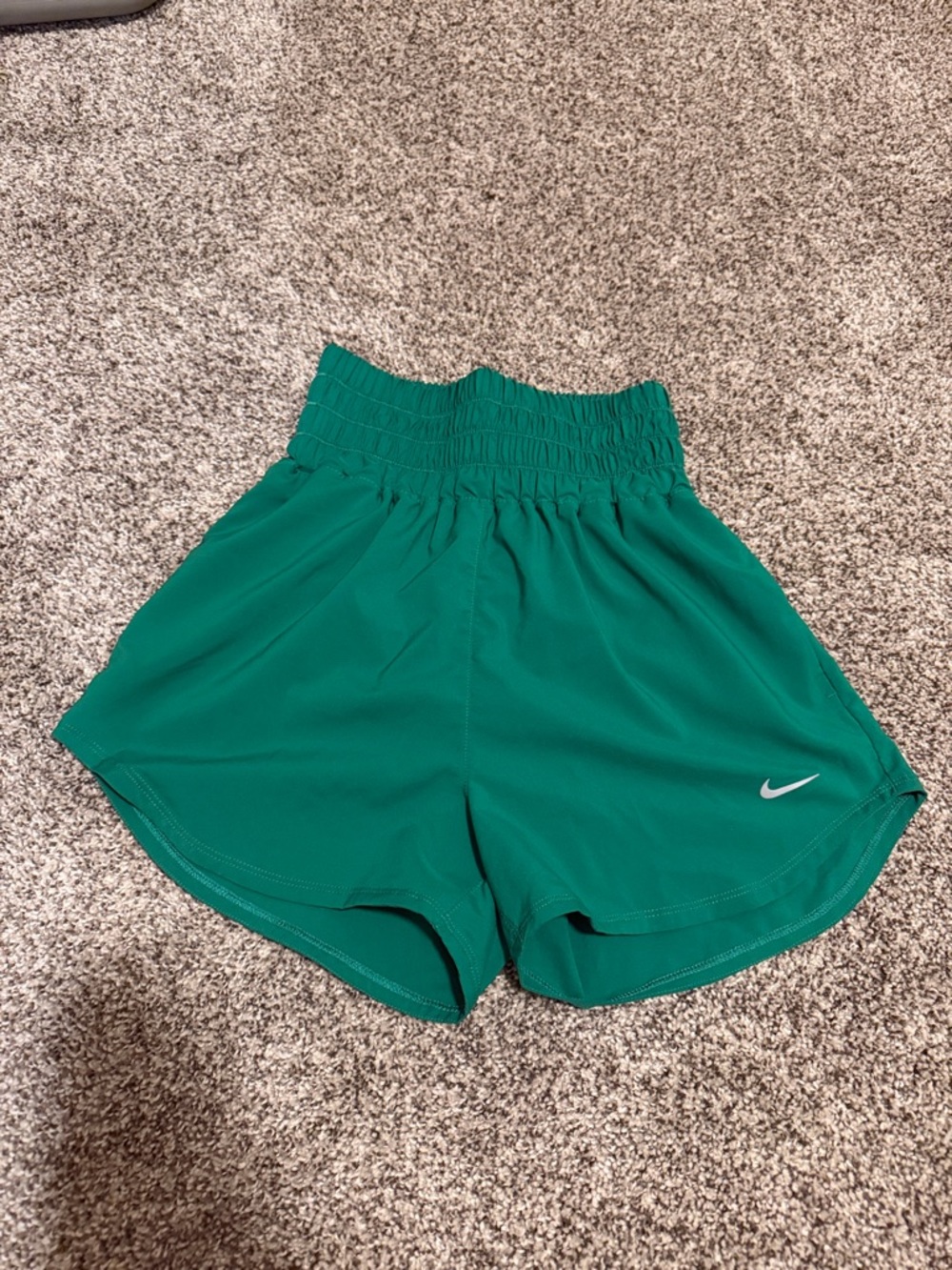 Nike Women's one dri fit ultra high rise Athletic Shorts in Emerald Green